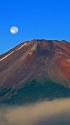 富士山頂に落ちる満月