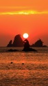ゴジラ岩に落ちる夕日
